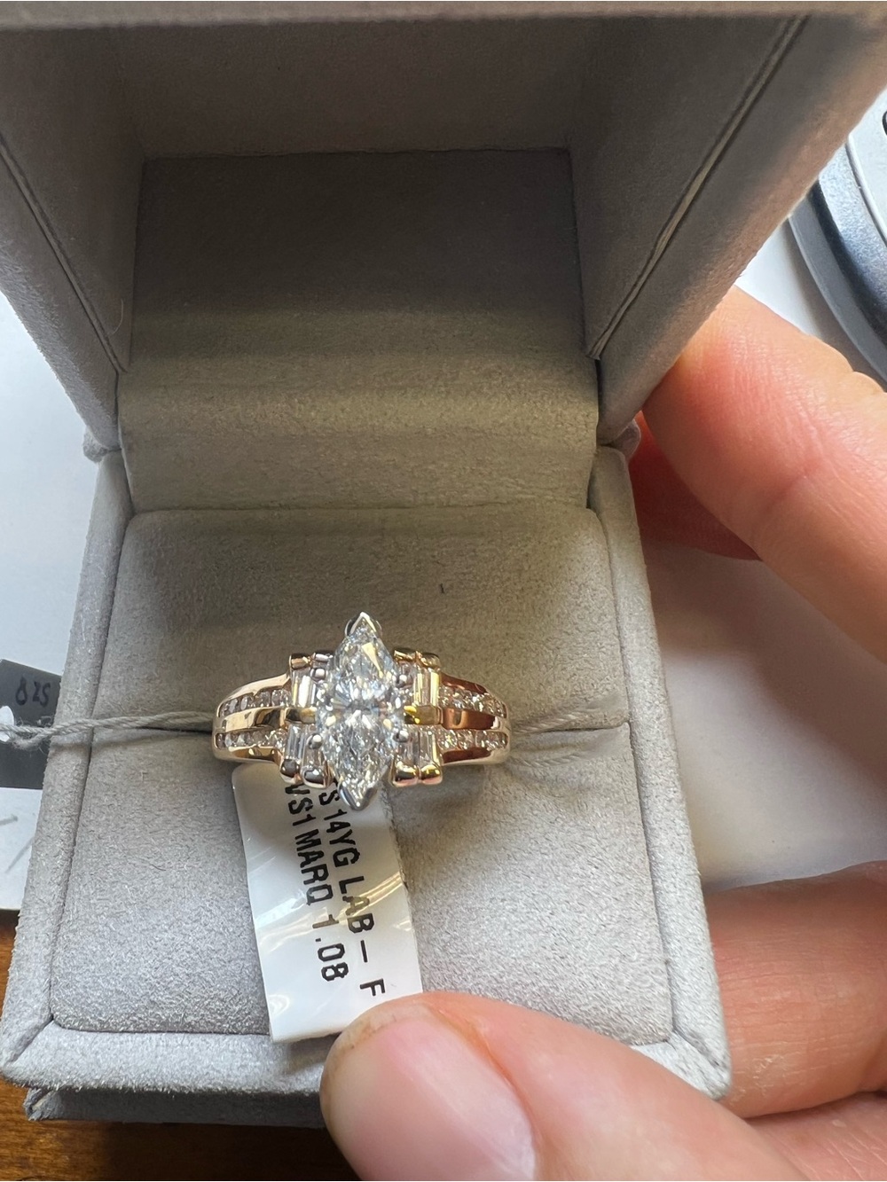Beautiful 14k yellow gold ring 
Canter stone is Marquis 1.08 F vs1 IGI certifica